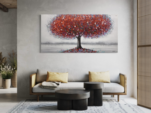 Ein Gemälde mit einem roten Baum.